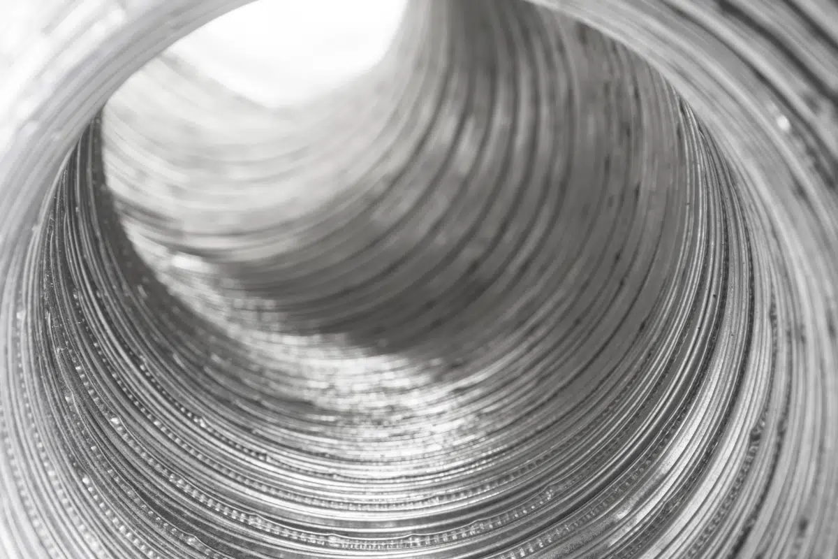 Inside view of a freshly cleaned dryer vent duct — clear and unrestricted